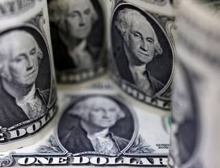 Dólar fecha a R$ 5,60 com apagão cibernético e eleições americanas